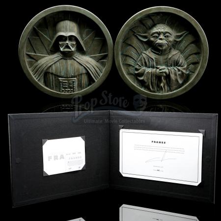 STAR WARS: THE COMPLETE SAGA - George Lucas-Signed Star Wars: Frames Tipped-In Page and Prototype Medallions
